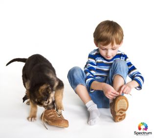 child tying shoes
