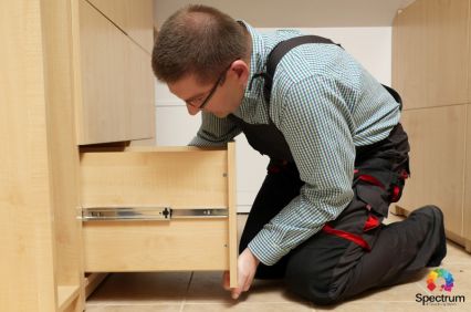 technician working on drawer 
